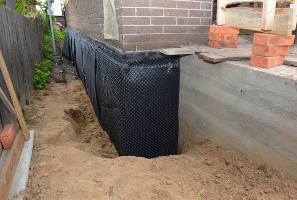 SJ Waterproofing Pros technician performing targeted Basement Waterproofing assessment in Landing, NJ